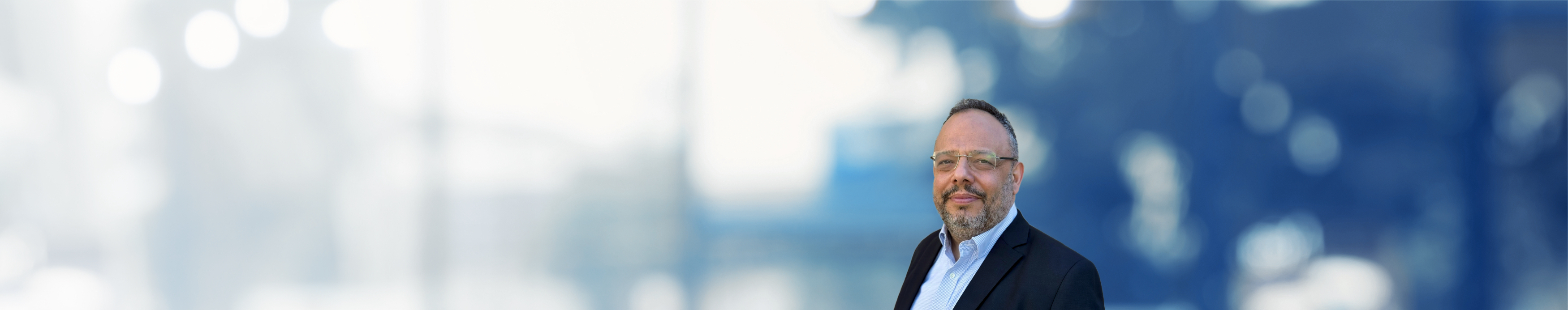 Tal Becker, Ph.D., Honigman LLP Photo